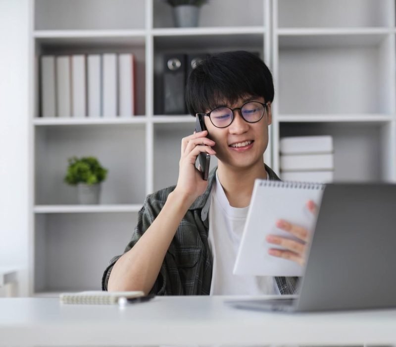young-asian-man-uses-laptop-to-work-on-financial-management-financial-transactions-and-use-of-1.jpg